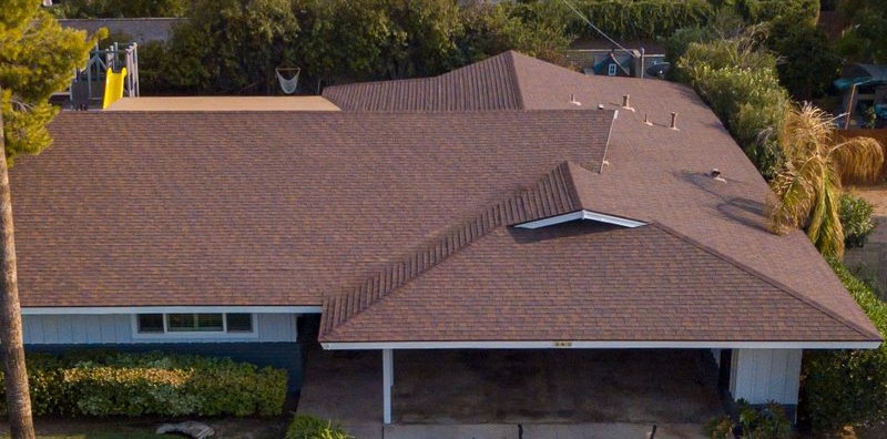 Top-down aerial view of residential roofs